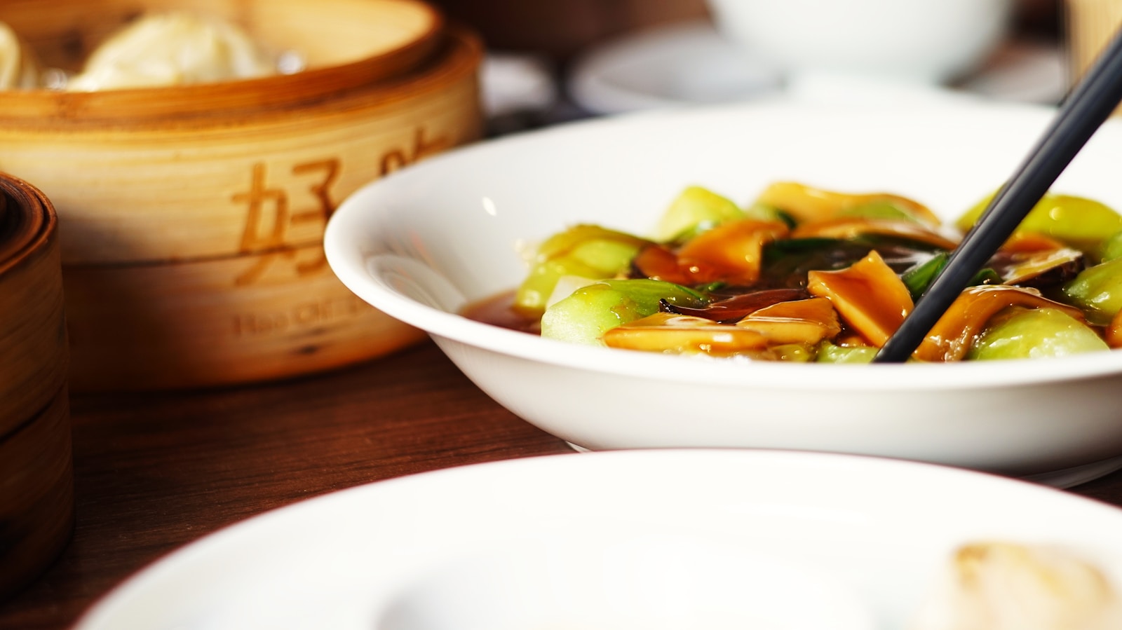 A close up of a bowl of food on a table